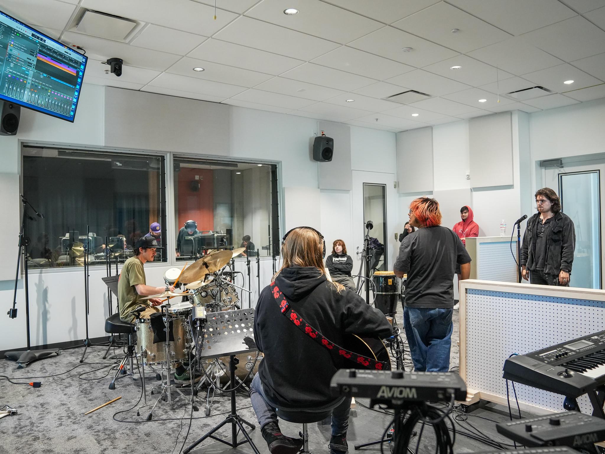 students in the recording room