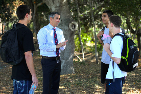 Brad at the creek with students