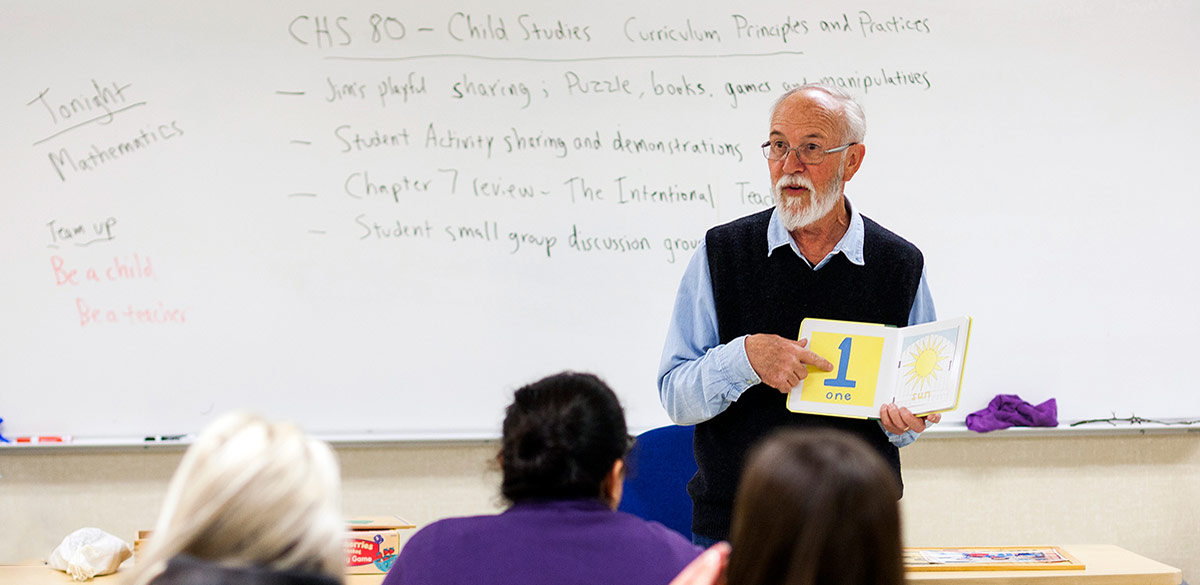 Instructor teaching classroom of students