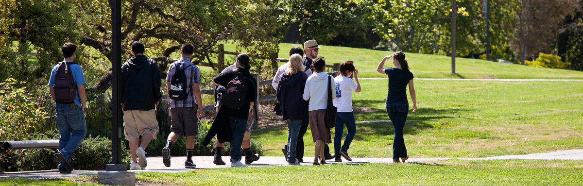 Student tour goup walking through campus