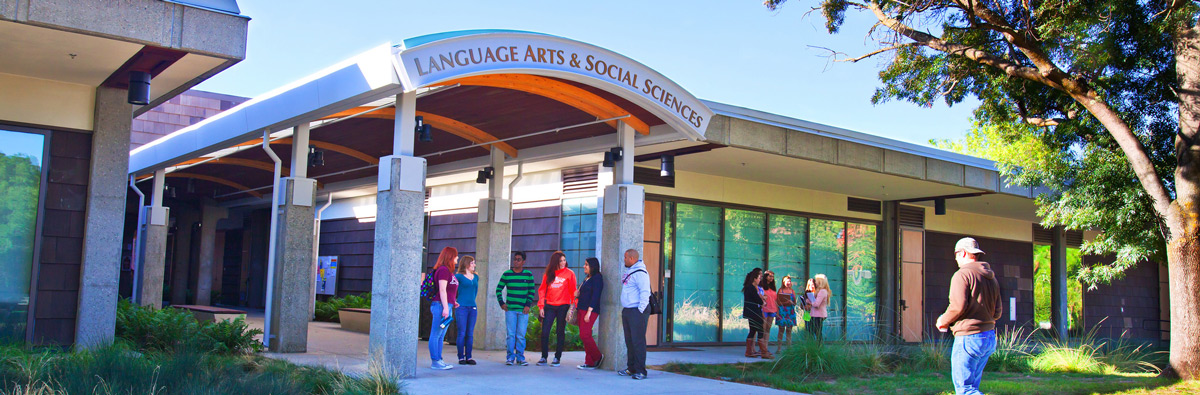 Students gathered in front of the Language Arts and Social Science building Students gathered in front of the Language Arts and Social Science building