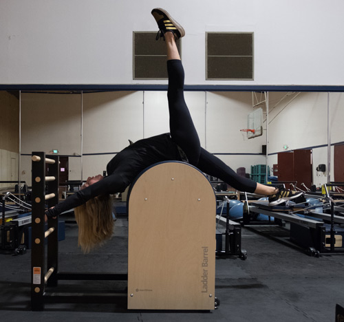 Heidi stretching on barrel device