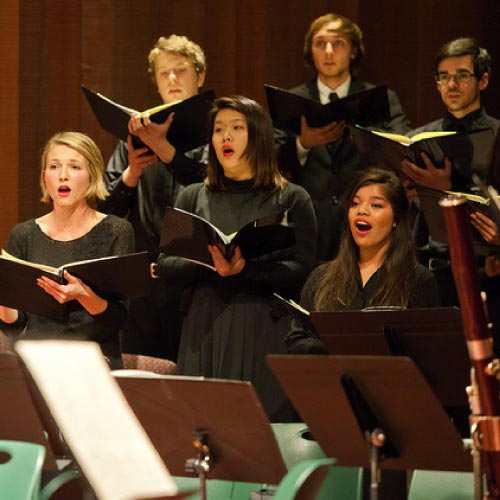 Choral students singing during concert