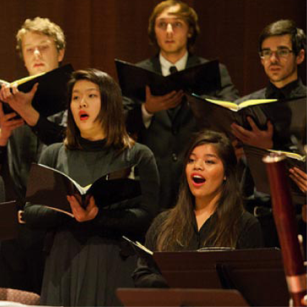 Choral students singing during concert