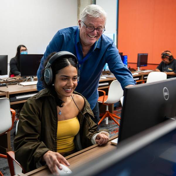 professor forehan and a student in a music production class