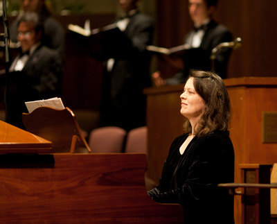 Instructor playing piano