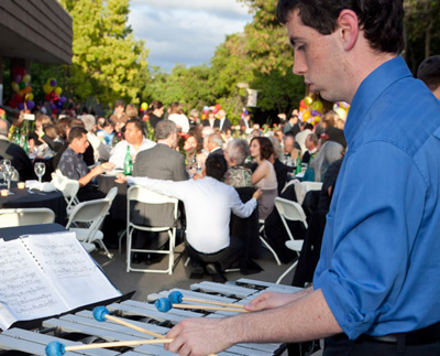 Student playing xylophone