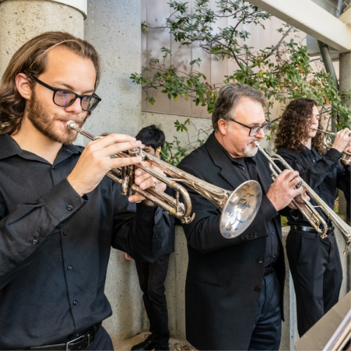 trumpet players wearing all black