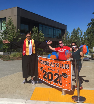 Flores graduates with the Class of 2020.