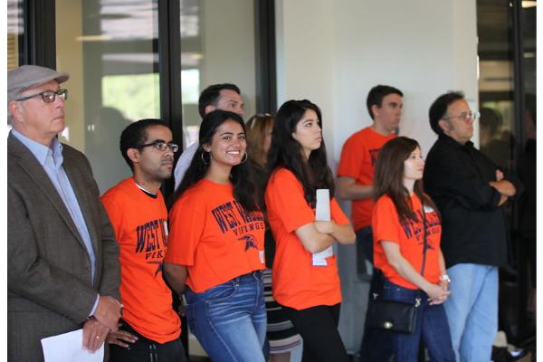 Student ambassadors wearing orange shirts