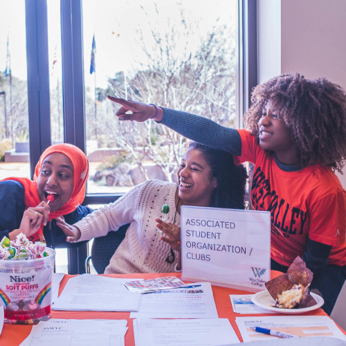 Student representatives at table for Student Government and Clubs