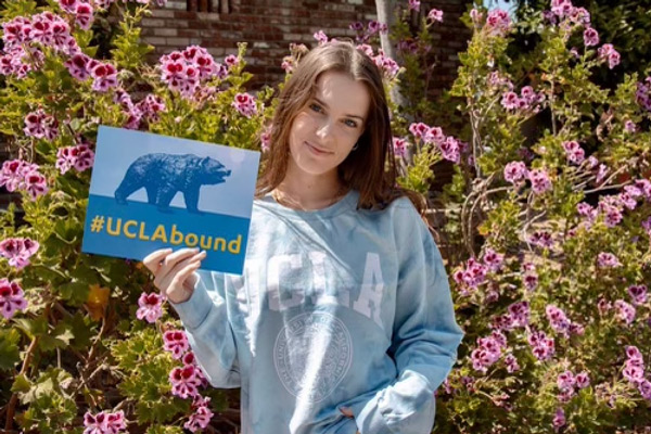 Paulina Berestov with UCLA sign