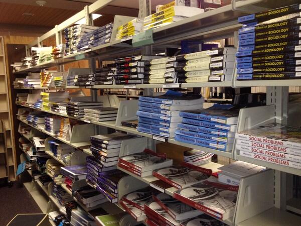 piles of books in the BFF shelves