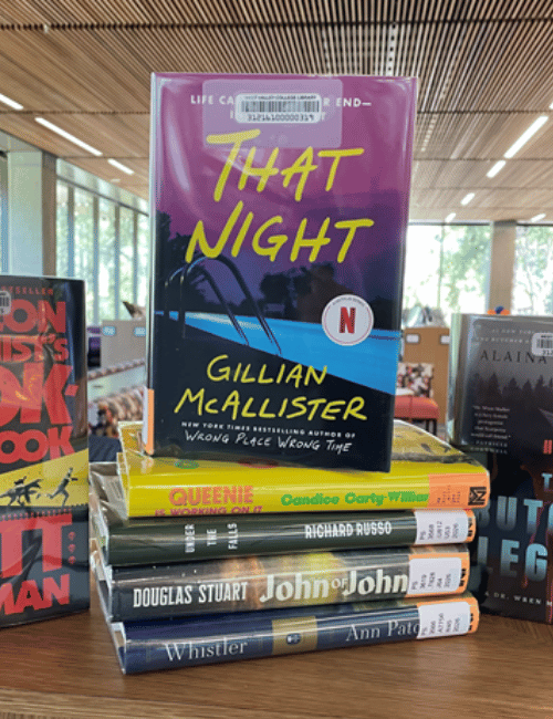 stack of featured books in the library