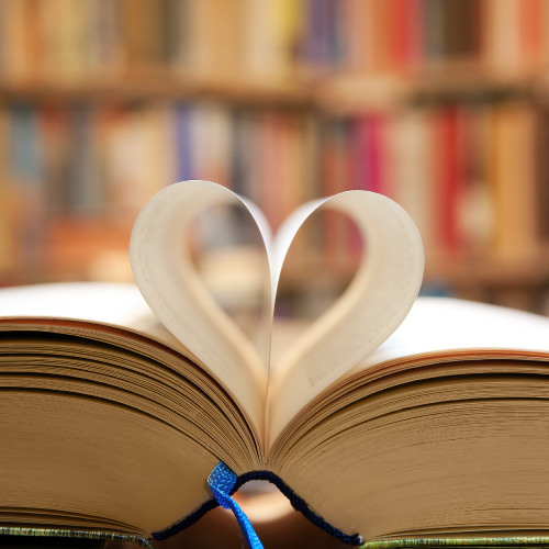 Book with pages folded into heart