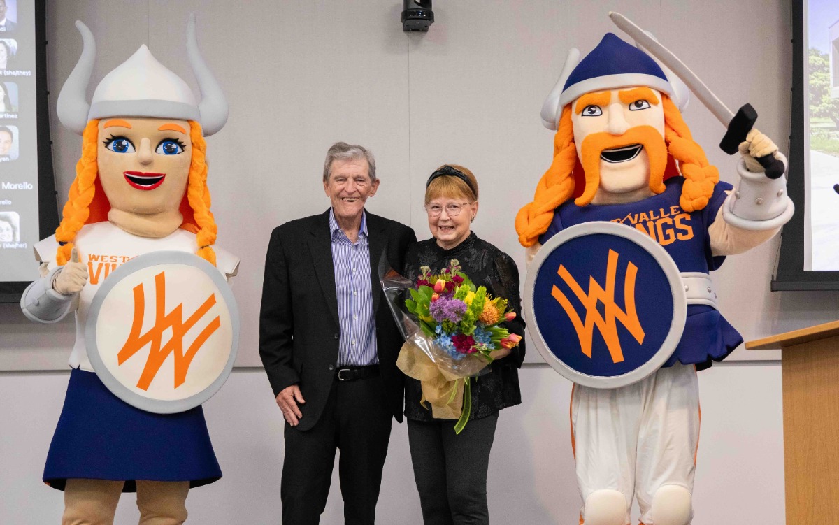 howard and kimberly gore with vik and viktoria mascots
