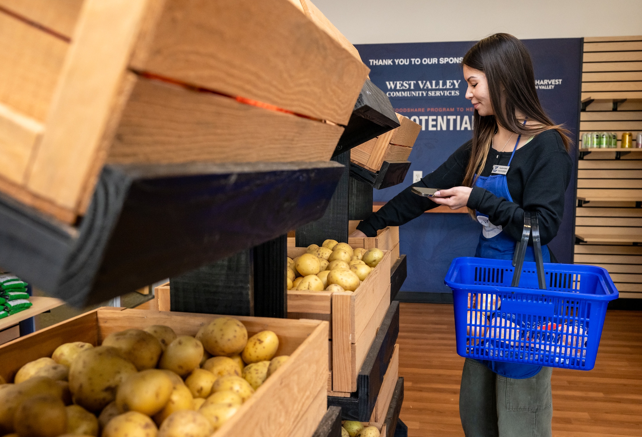 female student getting groceries in the pantry