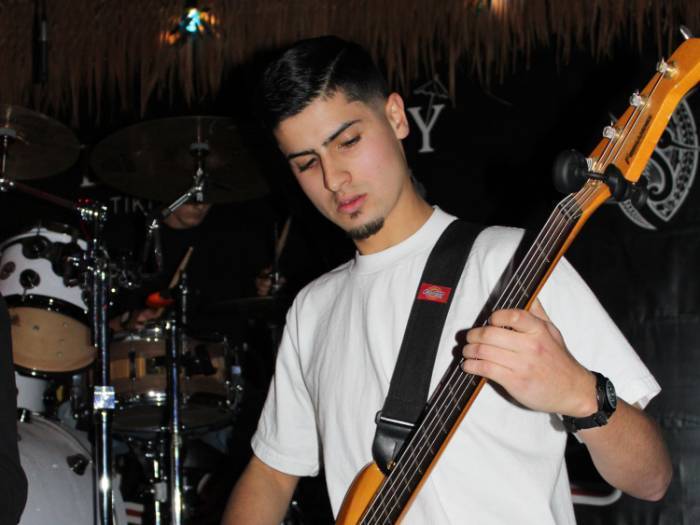 WVC Gabe Abatecola playing guitar