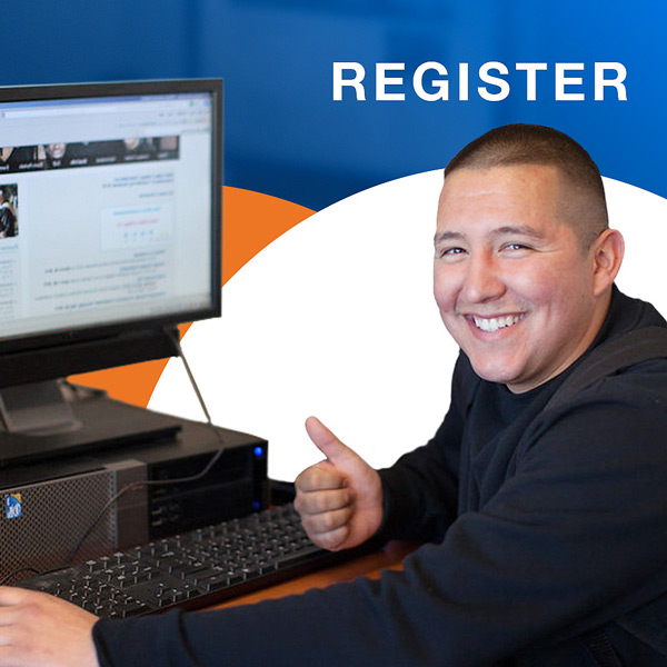 Smiling student with thumbs up at computer