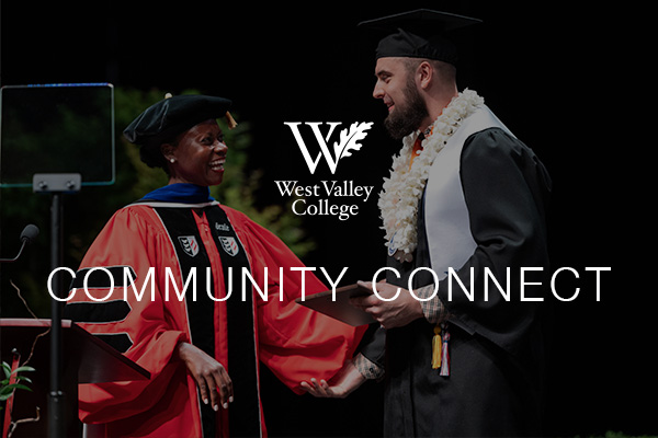 Decorative Image. President Taylor-Mendoza and student on graduation stage.