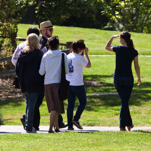 Group of students on tour walking through campus