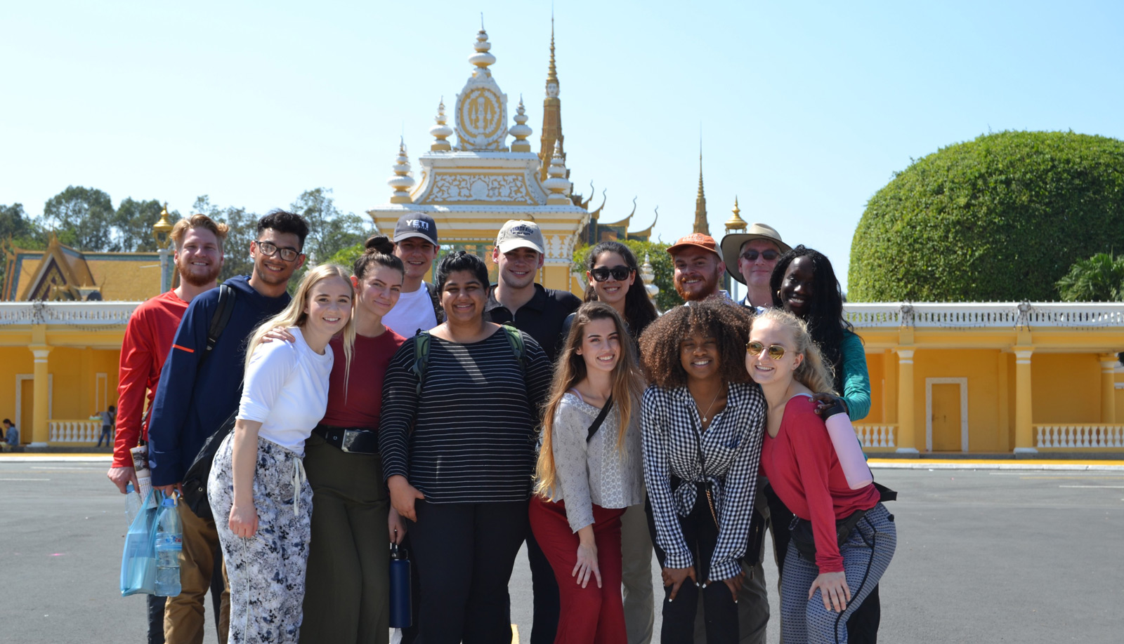 Service Learning students in front of Cambodian palace