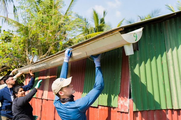 Cade lifting gutters in Cambodia