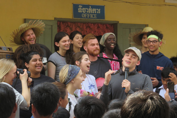 Service Learning and Cambodian students singing together