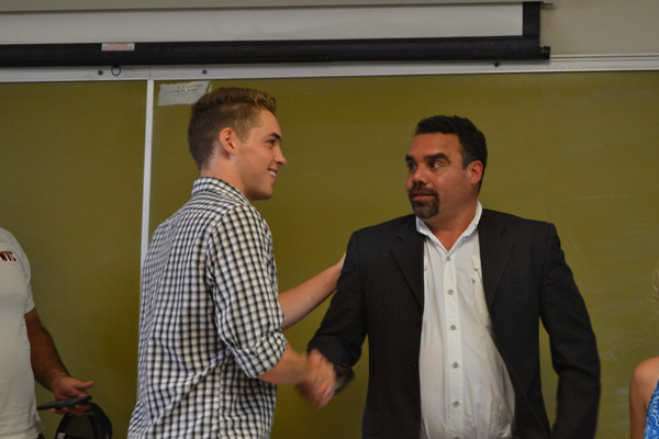 Cade shaking hands in Puerto Rico