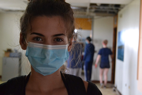 Service Learning student in Puerto Rico with mask