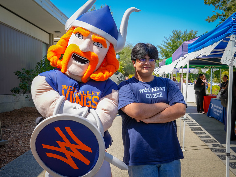 parsa with vik the mascot